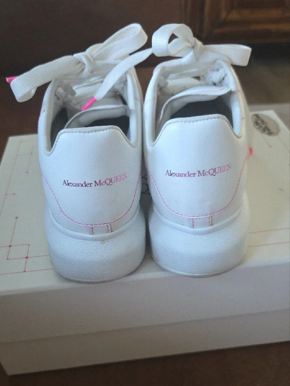 Alexander McQueen White Sneakers with Pink & Yellow Eyelet Accents
